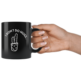 Cactus I don't do hugs black coffee mug