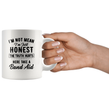 I'm Not Mean I'm Just Honest The Truth Hurts Here Take A Band Aid White Coffee Mug