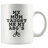 My mom taught me my abgs nurse white coffee mug