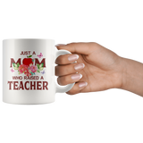 Just a mom who raised a teacher floral white coffee mug