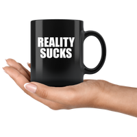 Reality sucks black coffee mug