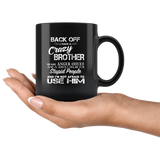 Back off i have a crazy brother he has anger issues and a serious use him black coffee Mug
