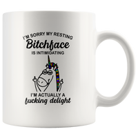 I'm sorry my resting bitchface is intimidating, actually a fucking delight unicorn white coffee mug