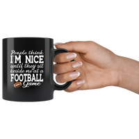 People think I'm nice until they sit beside me at a football game black coffee mug
