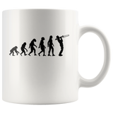 The theory of evolution trombone white coffee mug