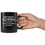 Don't piss off old people the older we get the less life in prison is a deterrent black coffee mug