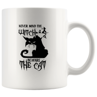 Never mind the witch beware the cat white coffee mug