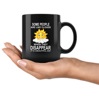 Some people are like clouds when they disappear it's a beautiful day funny sun black coffee mug
