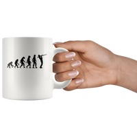 The theory of evolution trombone white coffee mug