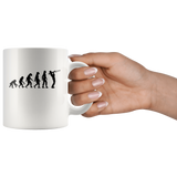 The theory of evolution trombone white coffee mug