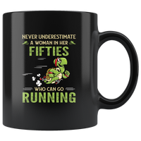 Never underestimate a woman in her fifties who can go running turtle black coffee mug