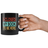 I closed my book to be here black gift coffee mug