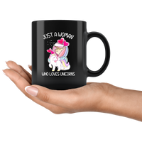 Just a girl who loves unicorns black coffee mug