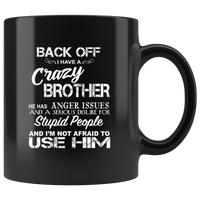 Back off i have a crazy brother he has anger issues and a serious use him black coffee Mug