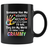 Someone has wrapped around their little finger to me they are my world, to them i am grammy black coffee mug