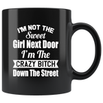 I'm not the sweet girl next door I'm the crazy bitch down the street black gift coffee mug