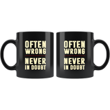 Often wrong never in doubt black coffee mug