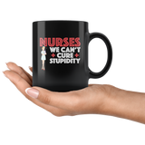 Nurses we can't cure stupidity black coffee mug