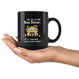 Be nice to the bus driver it's a long walk home from school black coffee mug