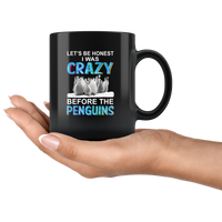 Let be honest I was crazy before the penguins black coffee mug