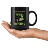 Never underestimate a woman in her fifties who can go running turtle black coffee mug
