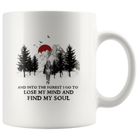Hiking camping and into the forest i go to lose my mind and find my soul women coffee mug