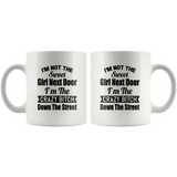 I'm not the sweet girl next door I'm the crazy bitch down the street white gift coffee mug