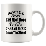 I'm not the sweet girl next door I'm the crazy bitch down the street white gift coffee mug