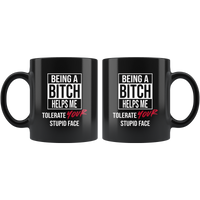Being a bitch helps me tolerate your stupid face black coffee mug