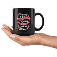 Somewhere in heaven my mother is smiling down on me I love you mom black coffee mug