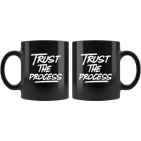 Trust the process black coffee mugs