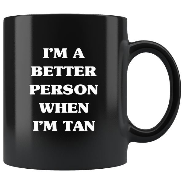 I'm a better person when I'm tan black coffee mug