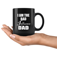 I am the bad influence dad father black coffee mug