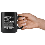Behind Every Lucky Son Is A Truly Amazing Mom Knows More Than Says Thinks Speaks Notices Realize Mess Me Punch Face Mothers Day Gift Black Coffee Mug