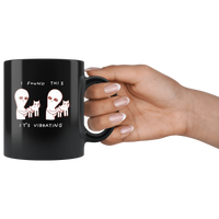Ailen and cat I found this it's vibrating black coffee mug