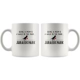 Being a mom is a walk in the park jurassic park mamasaurus white coffee mug