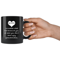 Grandma no matter what life throws at you at least you don't have ugly grandchildren black coffee mug